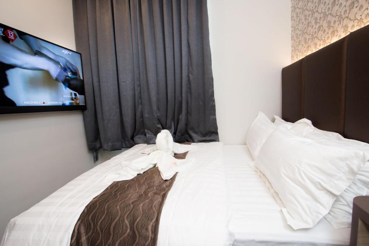 Spring Season Hotel Muar Extérieur photo