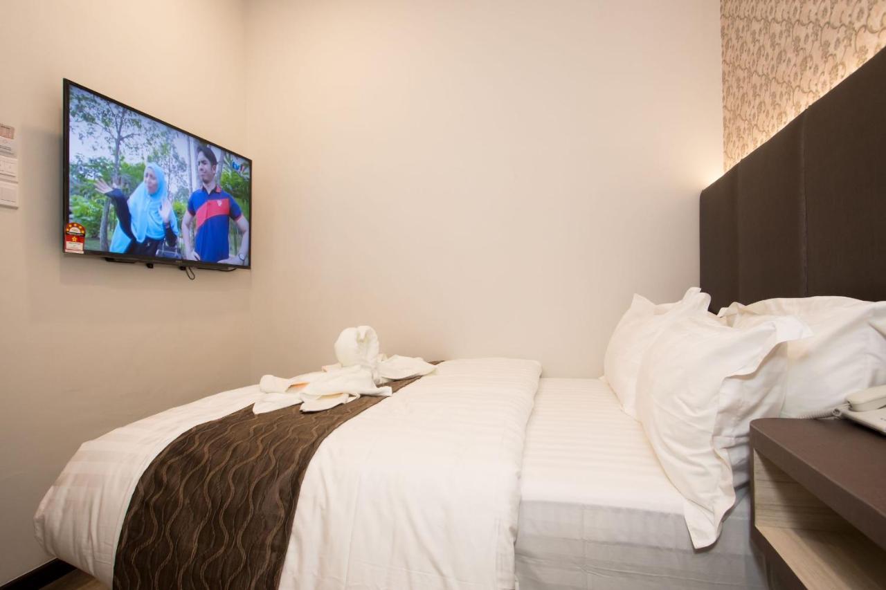 Spring Season Hotel Muar Extérieur photo
